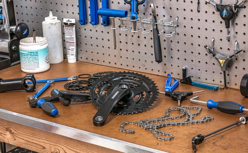 Side-by-side comparison of open-end, box-end, adjustable, and combination wrenches against a neutral backdrop